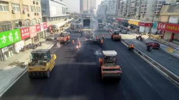 大庆路主路沥青摊铺完成通车简报